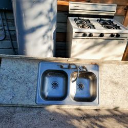 Miscellaneous Items , Wtr Heater, Gas Stove  & Sink  w/counter top