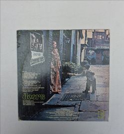 vintage vinyl record album of The Doors' Strange Days from 1967.