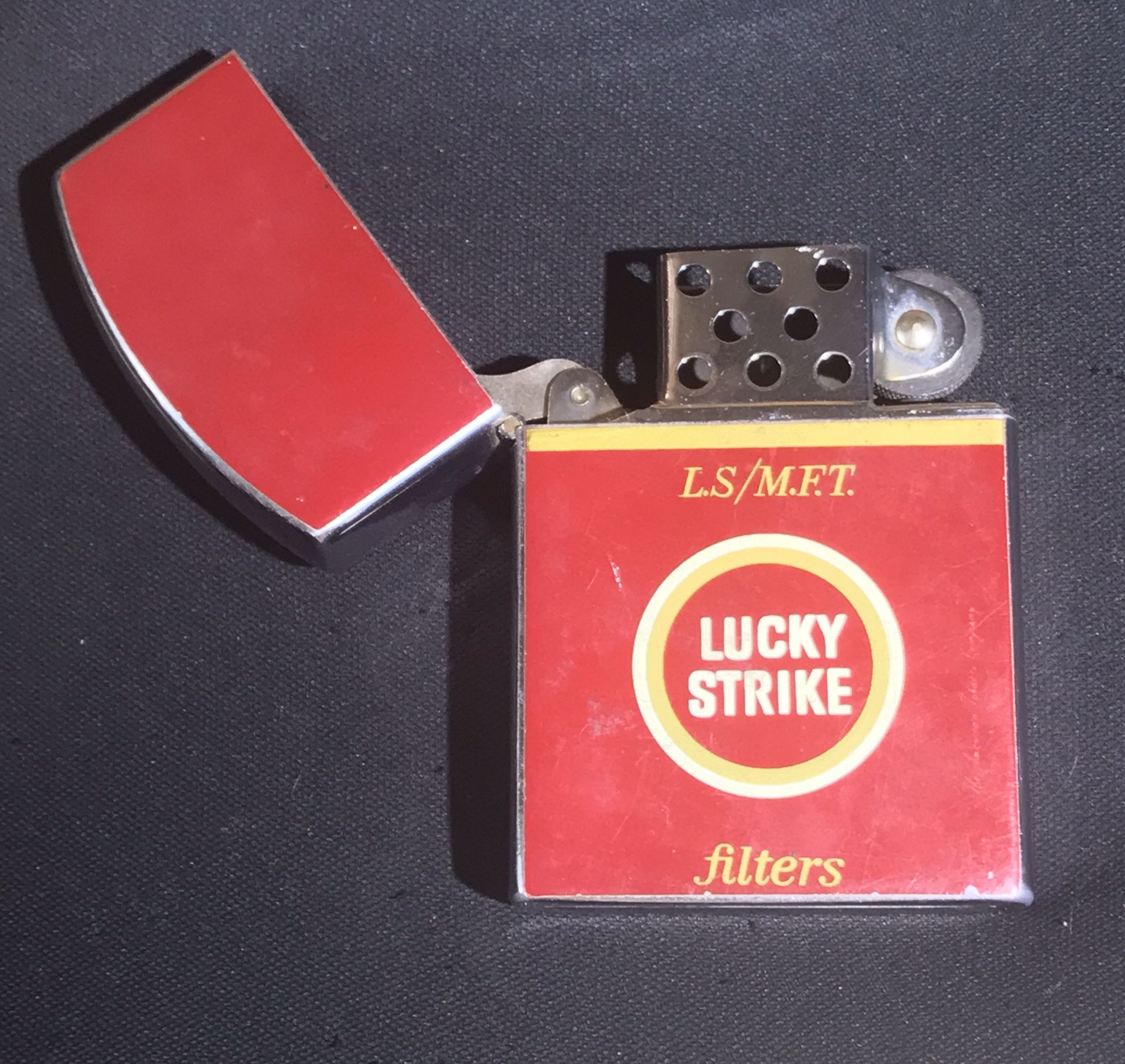 Rare vintage Jumbo extra large red Lucky Strike circle 16 hole table lighter