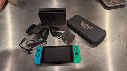 Nintendo Switch 1 and case