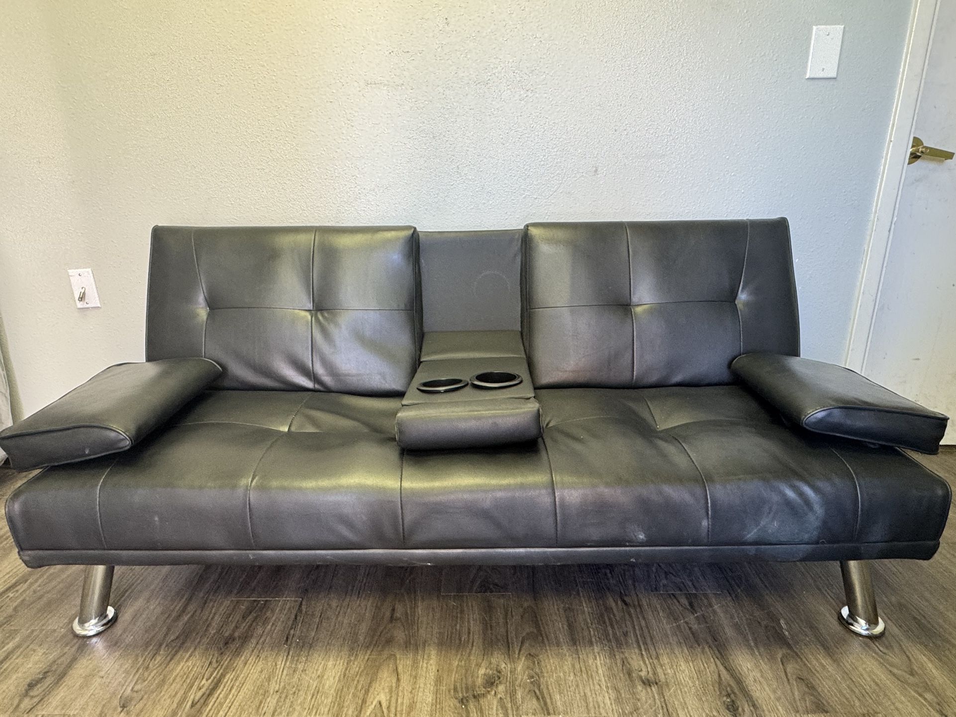 Black leather futon couch