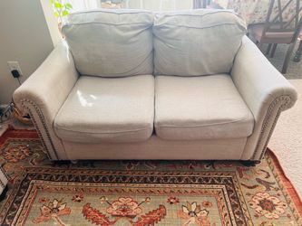 Beige fabric sofa , loveseat  and coffee table
