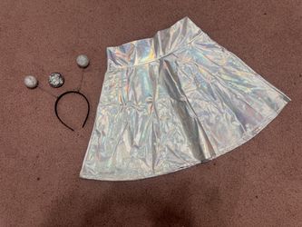 Shimmering holographic silver A-line skirt with a flattering high waist. Smooth, reflective fabric adds eye-catching shine for parties and events. Als