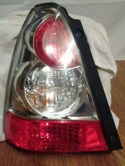 NEW but chipped Tail Light for 06-08 Subaru Forester