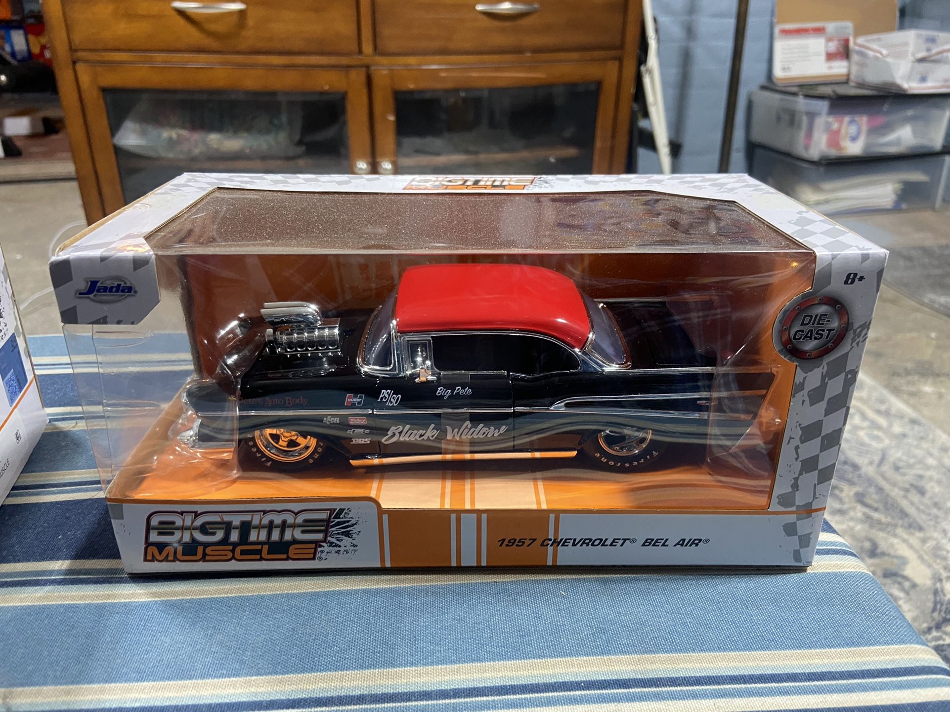 ) Diecast 1957 Chevrolet Bel Air Black with Red Top "Pete's Auto Body: Black Widow" "Bigtime Muscle" Series 1/24 Diecast Model Car by Jada