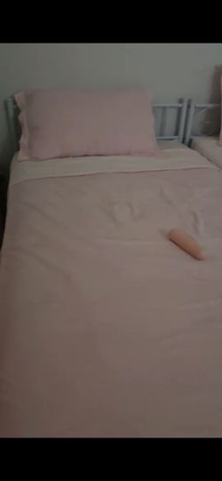 2 white twin size bed frame with mattress