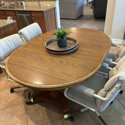 Table and 4 Rolling Chairs
