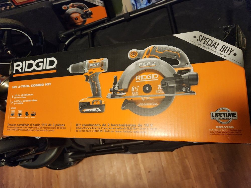 Ridgid Skill Saw, Drill, Batteries, And Bag