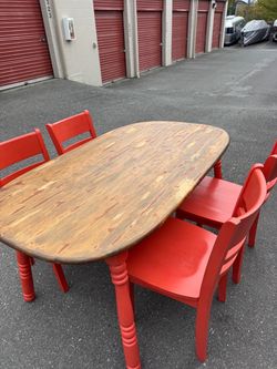Wooden table and four chairs