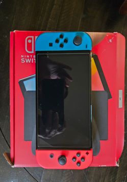 Nintendo Switch OLED w/ 2 Donkey Kong games