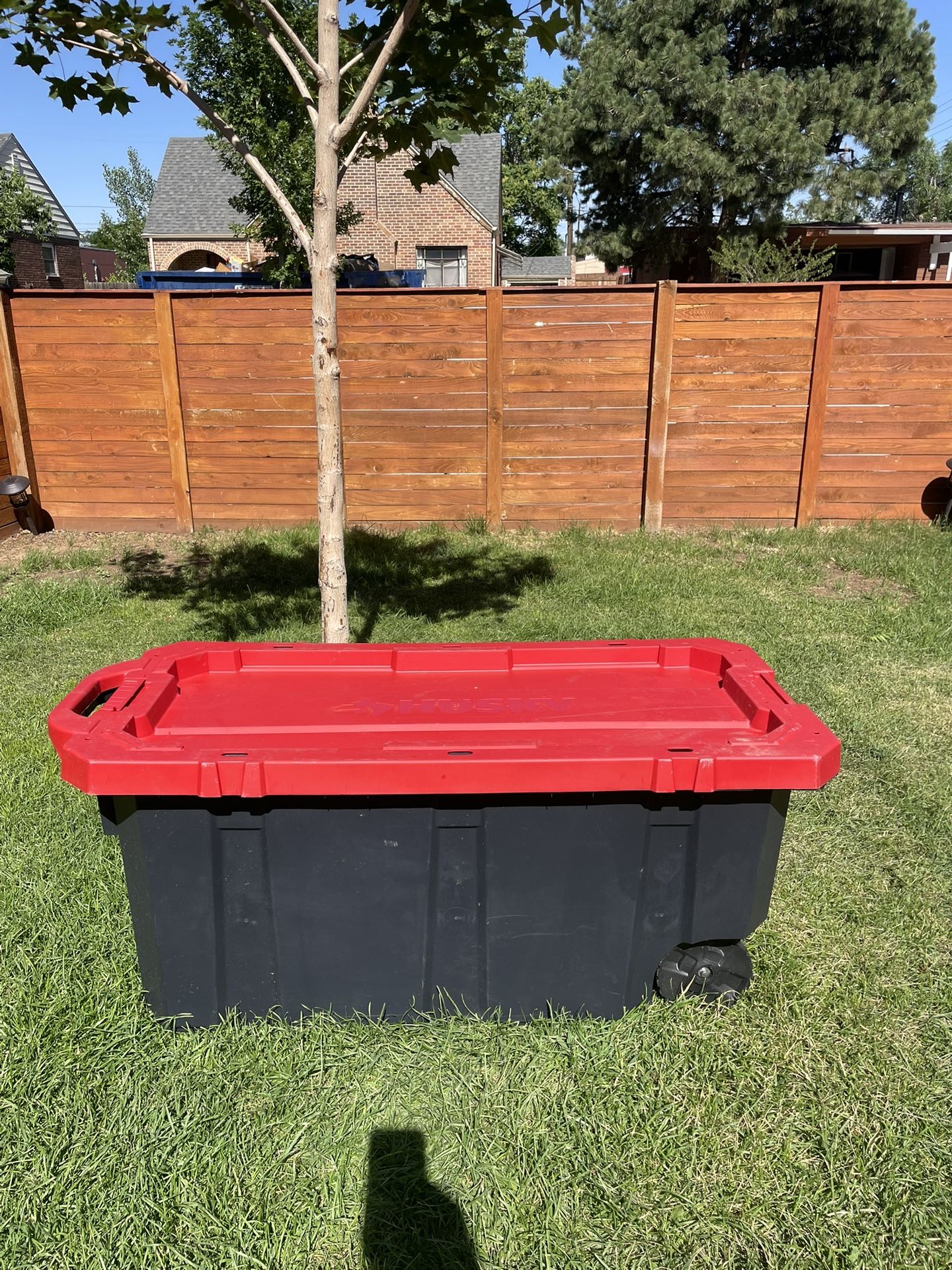 Husky 45 Gal. Heavy Duty Storage Tote with Wheels, Black/Red Lid