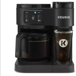 Versatile Keurig K-Duo Essentials coffee maker. Has both single serve K-Cup pod brewing and a carafe for ground coffee. Black color.