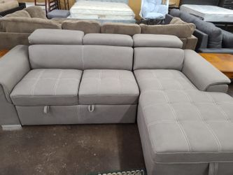 Sofa bed sectional withc a storage chaise and pullout bed
