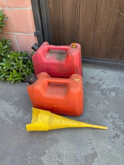2.5 and 5 gallon used gas cans. Includes funnel.