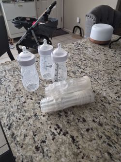 Baby bottle and liner.