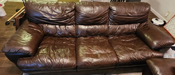 Full size leather couch and oversized chair w/ottoman