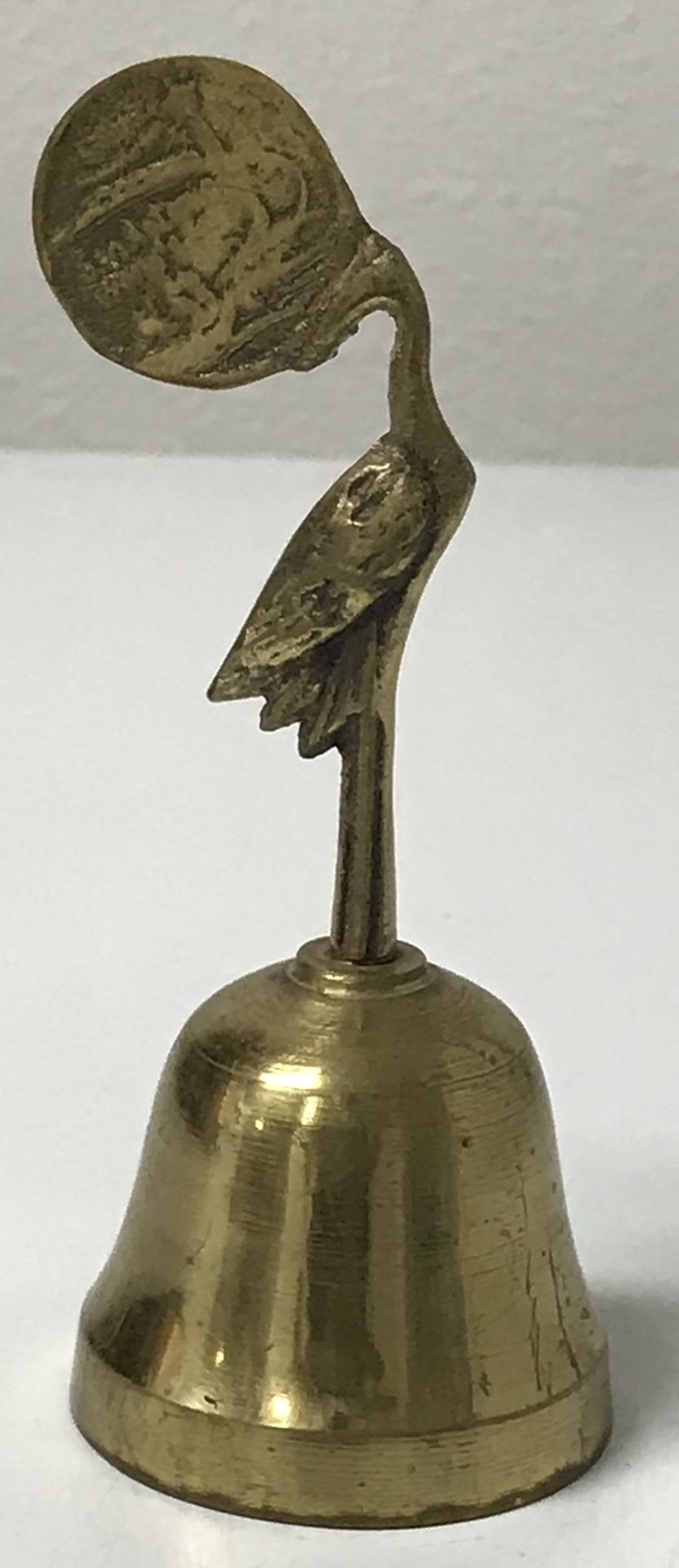 Vintage stork brass bell from the 1968 San Antonio worlds fair. Approximately 5” x 2”