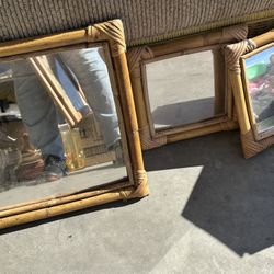 This is a set of vintage bamboo and rattan mirrors, possibly dating from the 1970s or 1980s