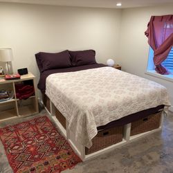 Queen bed frame with storage baskets