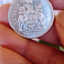 Canadian Silver Quarter And Half Dollar