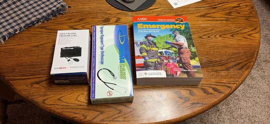 EMT text book, stethoscope and BP cuff