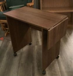 Drop leaf rolling secretary desk