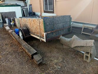 Metal trailer with tools and materials