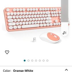 Brand new wireless keyboard and mouse combo ( orange and white color). 