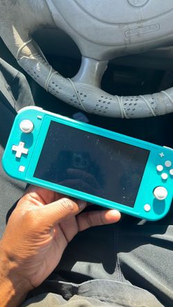 Nintendo Switch Lite W/Charger and Mario kart 8