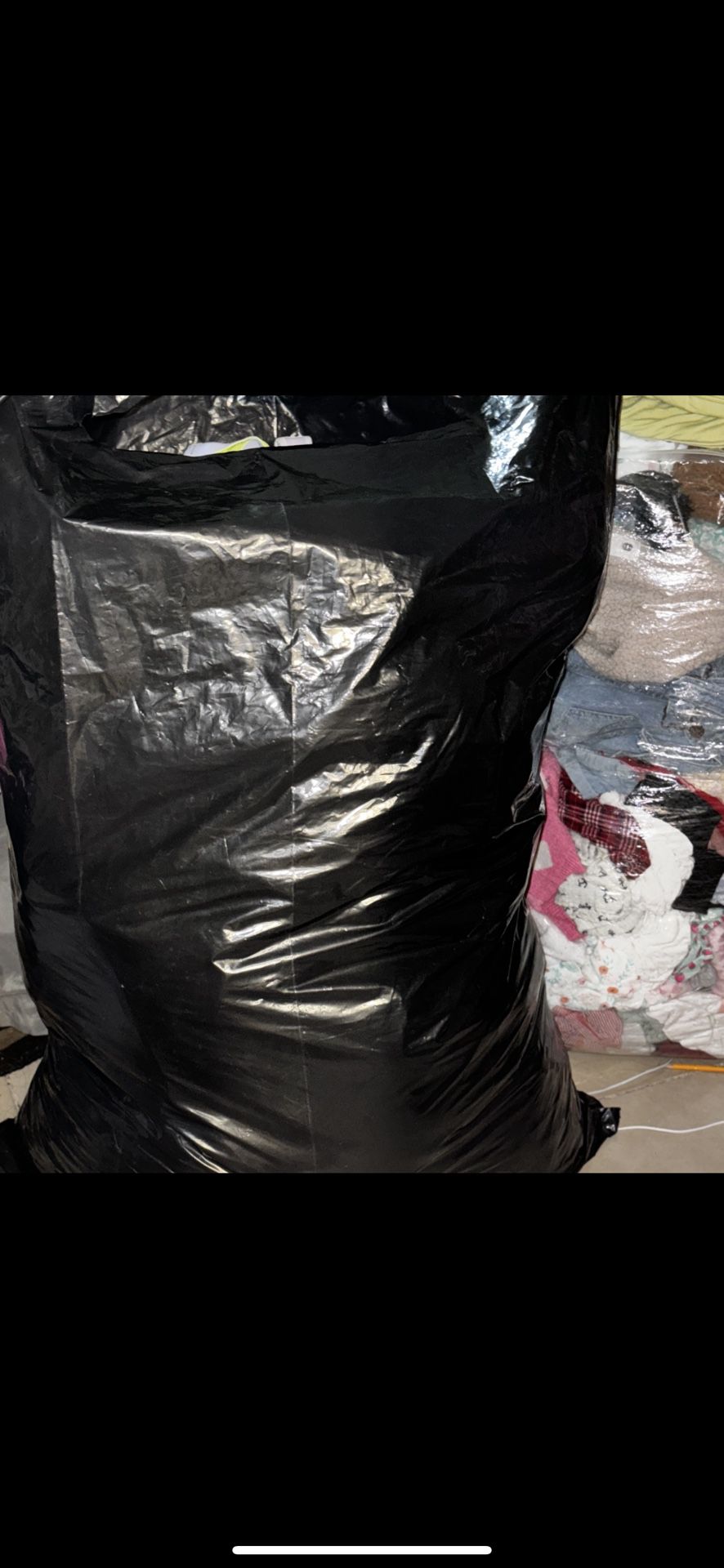 large bag with women's clothing in large, medium and small sizes, all for $25
