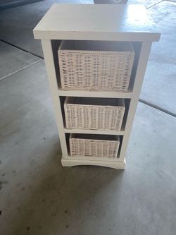 Small white shelf with removable baskets