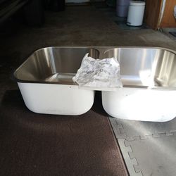 Stain.\nLess steel double sync new never installed