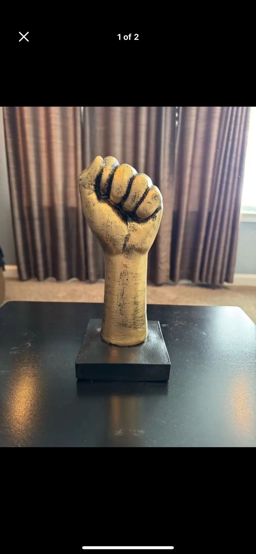 The Fist Pump Statue