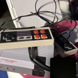 Nintendo With 2 Controllers 