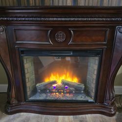 All wood electric fireplace.