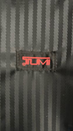 Tumi carry on suitcase
