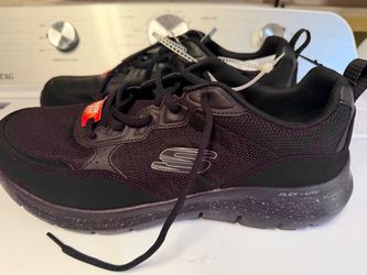Men Sketchers black shoes