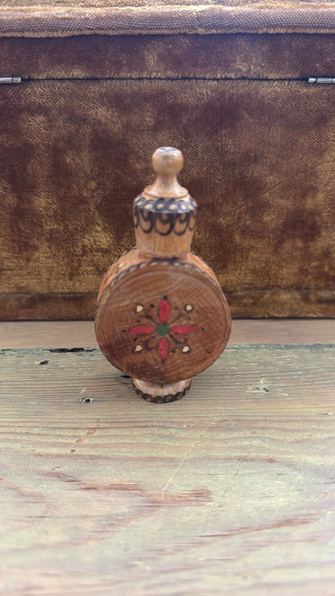 Vintage, hand-painted, wooden perfume bottle or flask, likely from Bulgaria