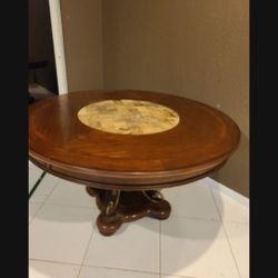 Eldorado High End Dining Room Table W/ Marble Cebter That Swirls To Serve