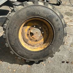 Skid Steer Tire And Wheel 12-16.5