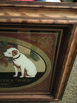Mirror picture vintage.Hear your master's voice and the dog's name is\nSippy