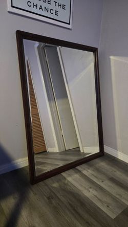 Mirror, wooden brown border.