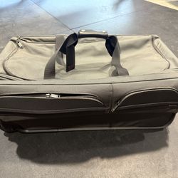 TUMI Roller Luggage Bag