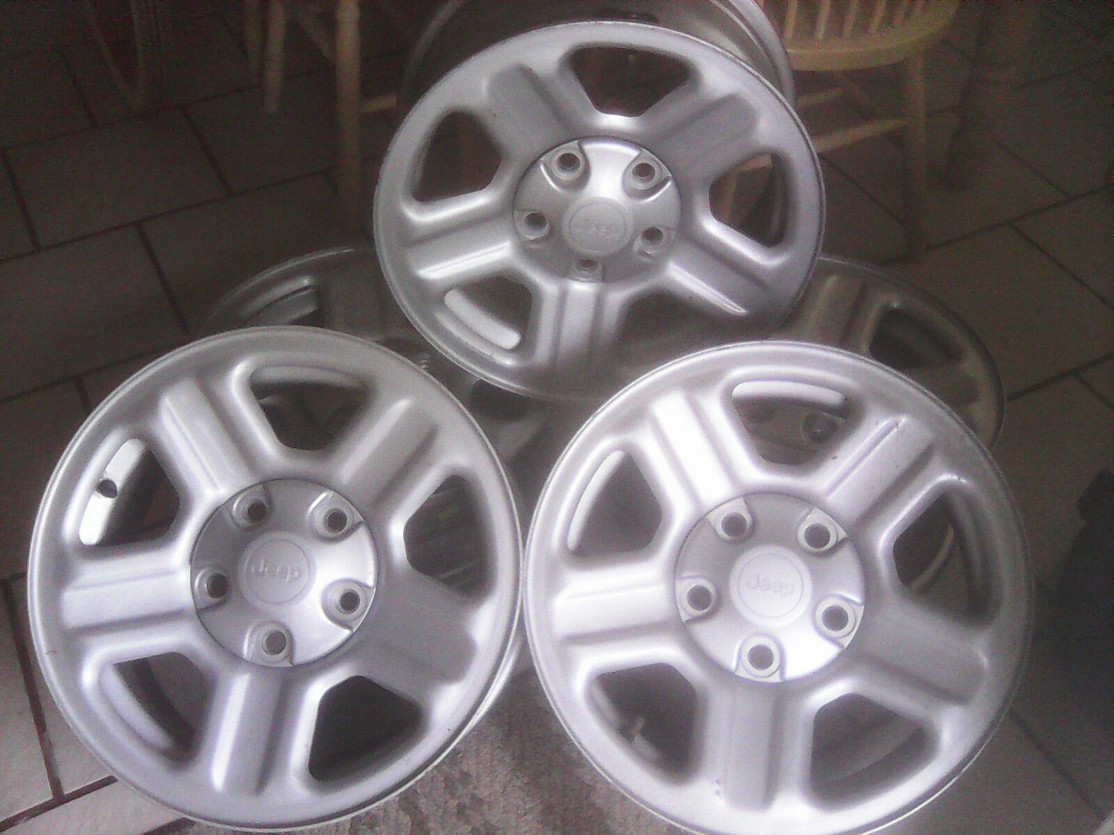 5 Jeep rims off 2012 Wrangler
