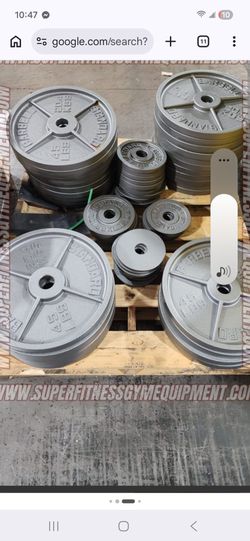 500 plus pounds of Olympic plates,barbell,bench press,squat