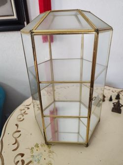 Glass display curio/ well taken care of