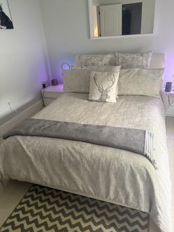 White Upholstered Double Bed Frame, side tables, chester drawers and mirror