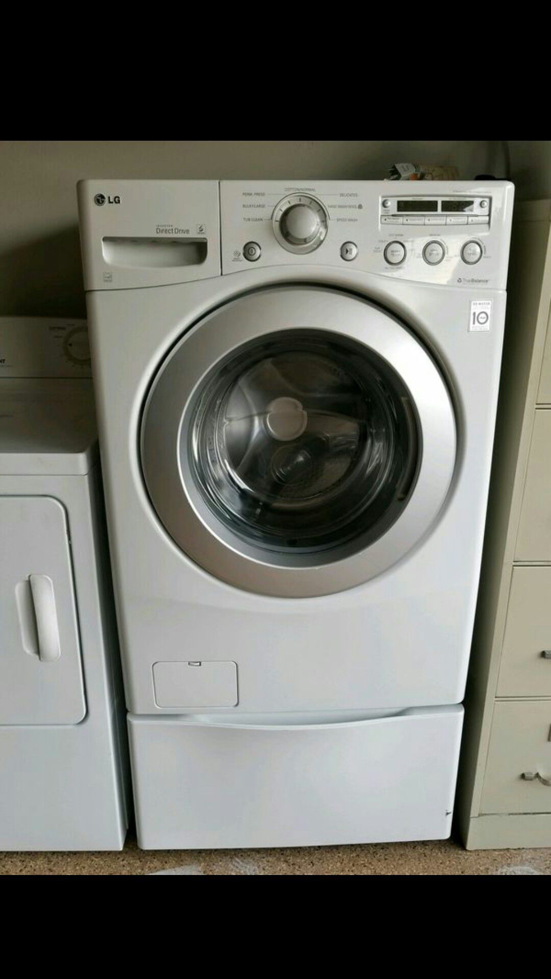 LG Electric Front Loader Washer with Laundry Pedestal with Storage