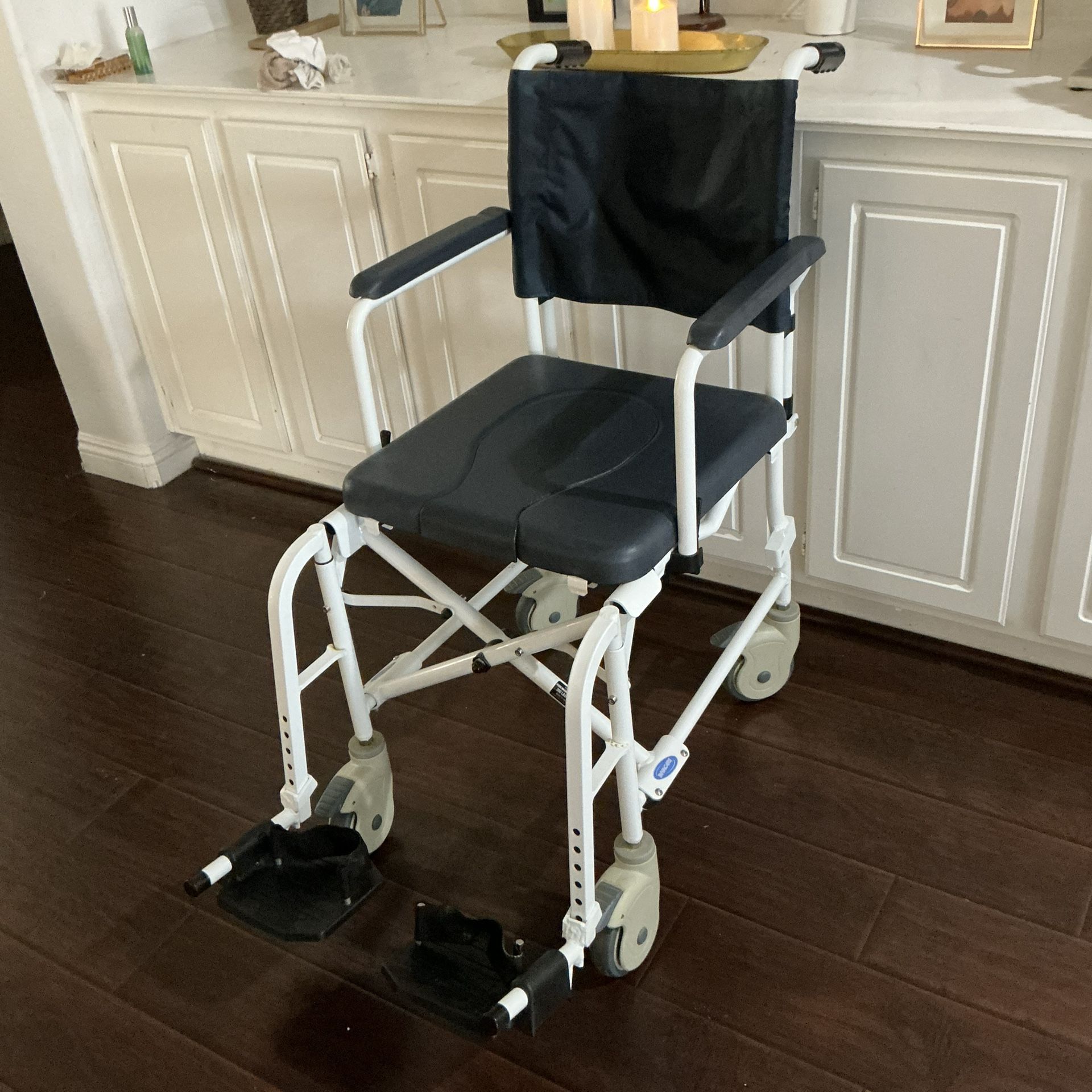 Rolling Wheel Chair/ Restroom Chair