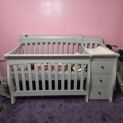 Gray Baby Crib with Attached Changing Table